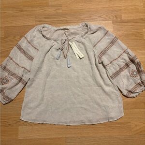 New “Love stitch” blouse size Medium with tag